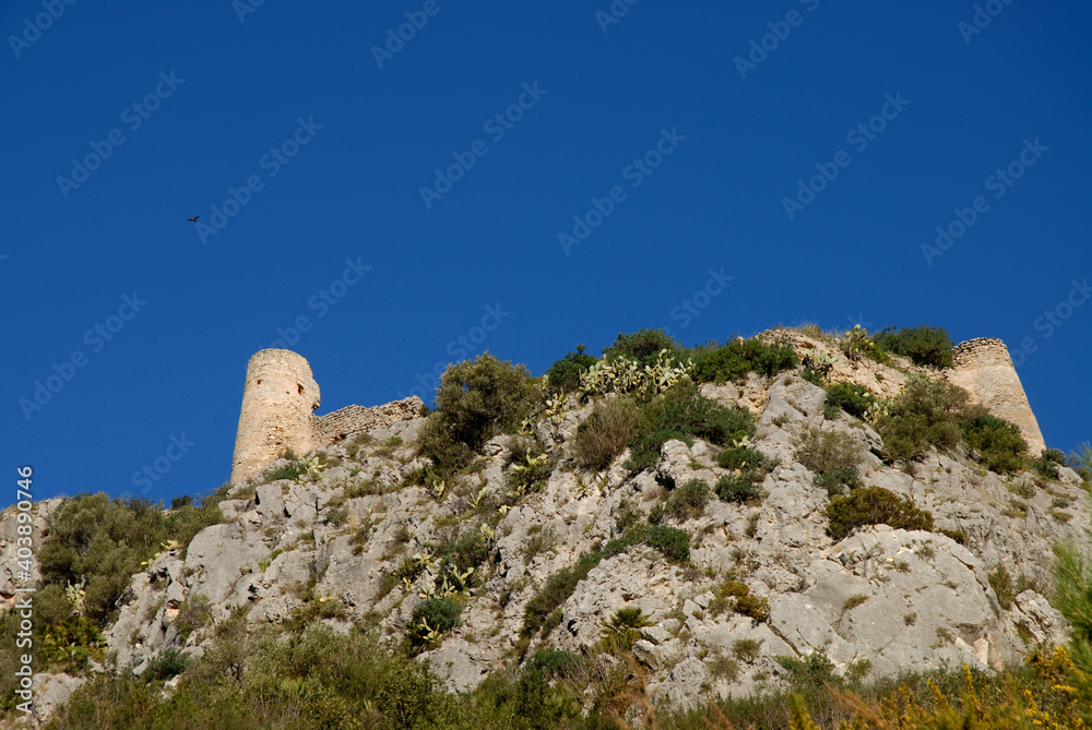 Gallinera Castle on a rocky promontory, Alicante Province, Spain