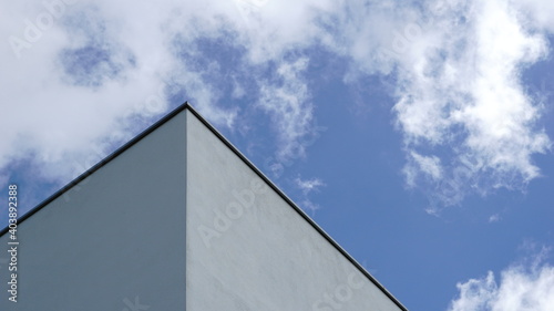 white facade against blue sky
