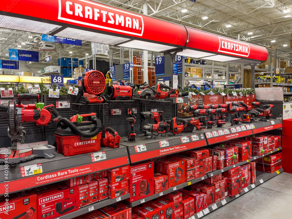 PORT CHARLOTTE, FLORIDA - January 08, 2021 : Craftsman Tools power tool  retail display at Lowe's home improvement store. Photos | Adobe Stock