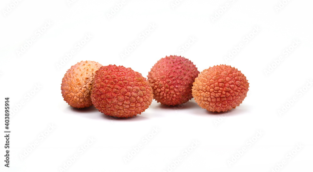 Group of fresh red ripe litchee (Litchi chinensis) tropical fruits isolated on white background, detail close up in different perspectives, Fruits from the lychee tree, Litchi chinensis