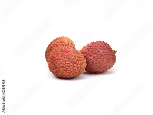 Group of fresh red ripe litchee (Litchi chinensis) tropical fruits isolated on white background, detail close up in different perspectives, Fruits from the lychee tree, Litchi chinensis