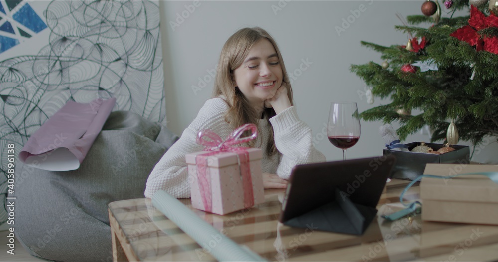 Woman wrapping Christmas presents gift Woman wrapping Christmas presents gift