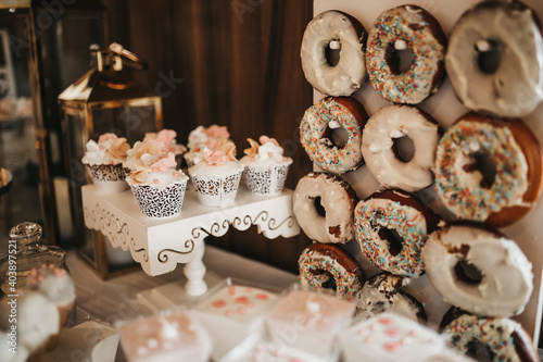 Closeup shot of delicious sweet desserts on an event table photo