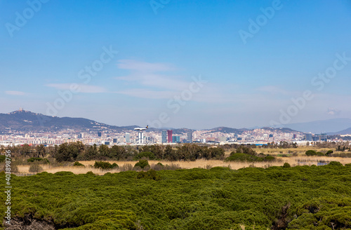 Landing strip at Barcelona airport with planes on the runway