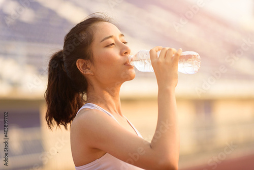 Young Asian woman drink water