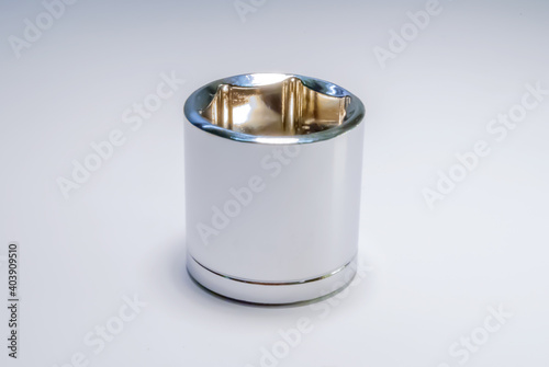 Closeup of  metal ratchet socket on white background  metal ratchet socket on white background