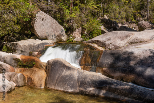 The waterfall at Cleopatra's Pool on the Torrent River on the Able Tasman Coastal Walk. Able Tasman National Park, New Zealand.