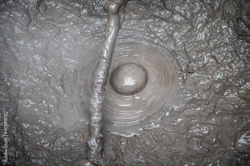 Canvas Print Bubbling hot mud pool in Rotorua, North Island of New Zealand.