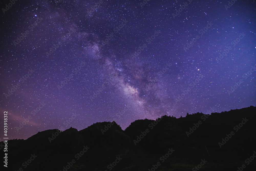 Stargazing at Oahu island, Hawaii. Starry night sky, Milky Way galaxy astrophotography.