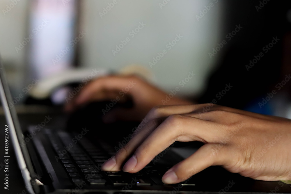 Hands typing on a keyboard. Hand typing keyboard. Hands typing on a keyboard. Hand typing keyboard.