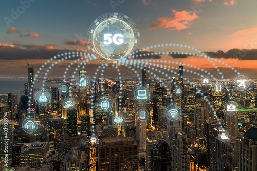 5G technology and computer network with internet of thing icon over Top view of Chicago Cityscape,USA downtown skyline, Architecture and building with tourist,Connectivity and global networks concept