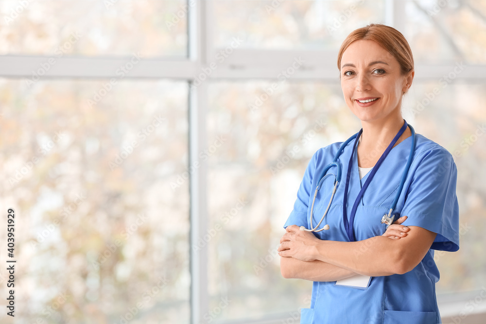 Portrait of female doctor in clinic Portrait of female doctor in clinic