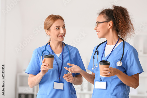 Female doctors drinking cof...