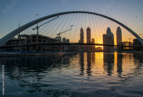 Dubai, UAE - 01.08.2021 Bridge over a Dubai Water canal known as Tolerance bridge. Outdoors