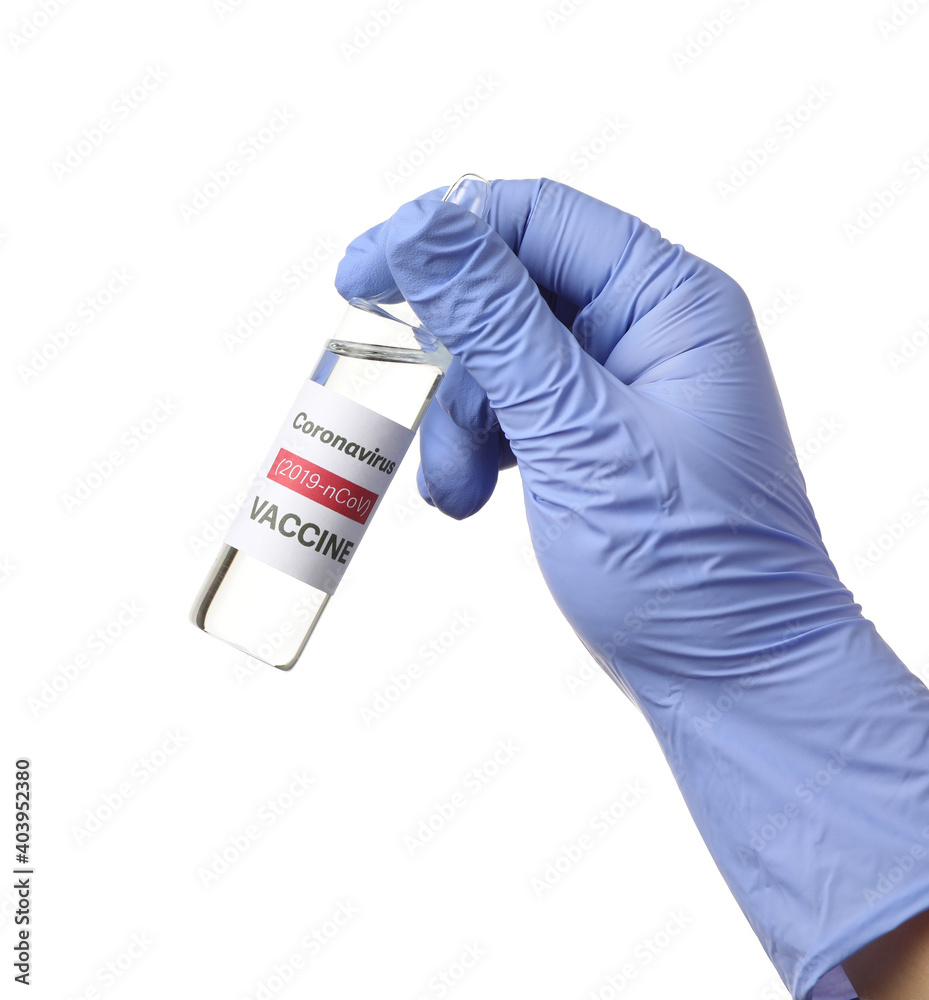 Doctor's hand with vaccine for immunization against COVID-19 on white background Doctor's hand with vaccine for immunization against COVID-19 on white background