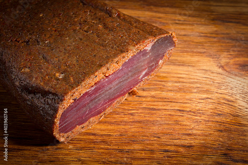 Smoked meat on a board photo