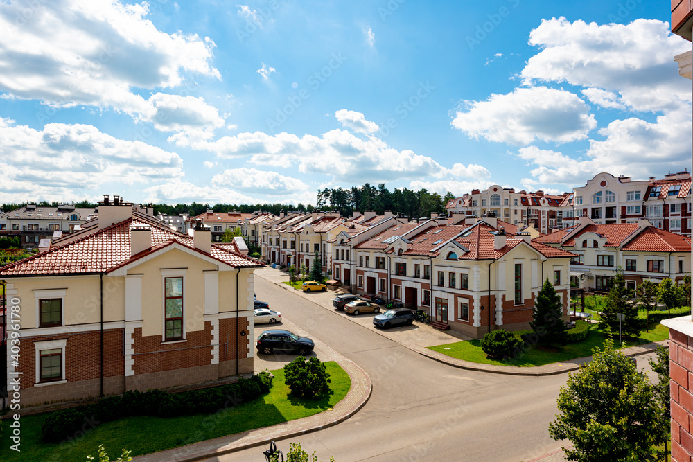 modern Russian village of low-rise penthouses and prestigious houses on a clear sunny day