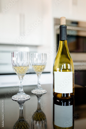 White wine bottle on the kitchen table