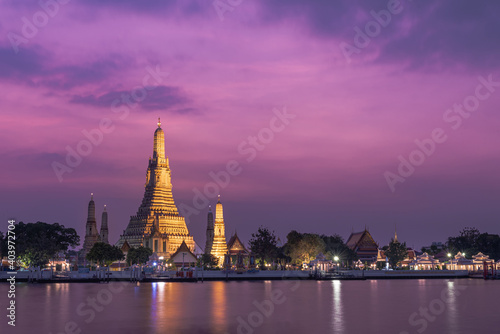 Wat Arun temple of dawn or wat chaeng  on the west  Thonburi  bank of the Chao Phraya river at twilight time in Bangkok Thailand.