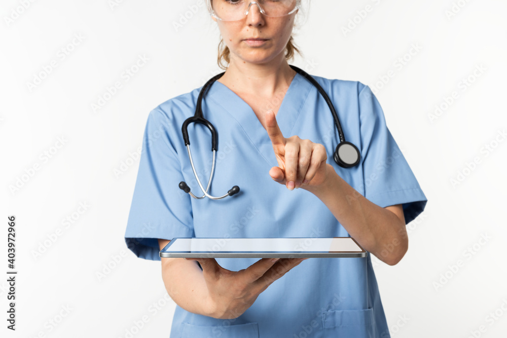 Doctor using tablet to diagnose medical technology Doctor using tablet to diagnose medical technology