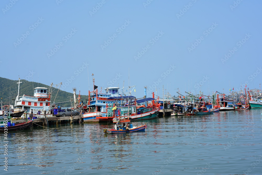 View of the fishing port overlooking the boat and Pattaya city. Which is a large city close to local fishing sources in Thailand