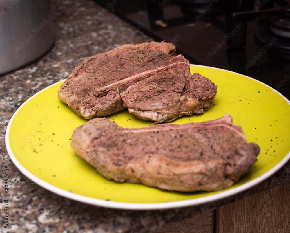 A plate of cooked steak A plate of cooked steak