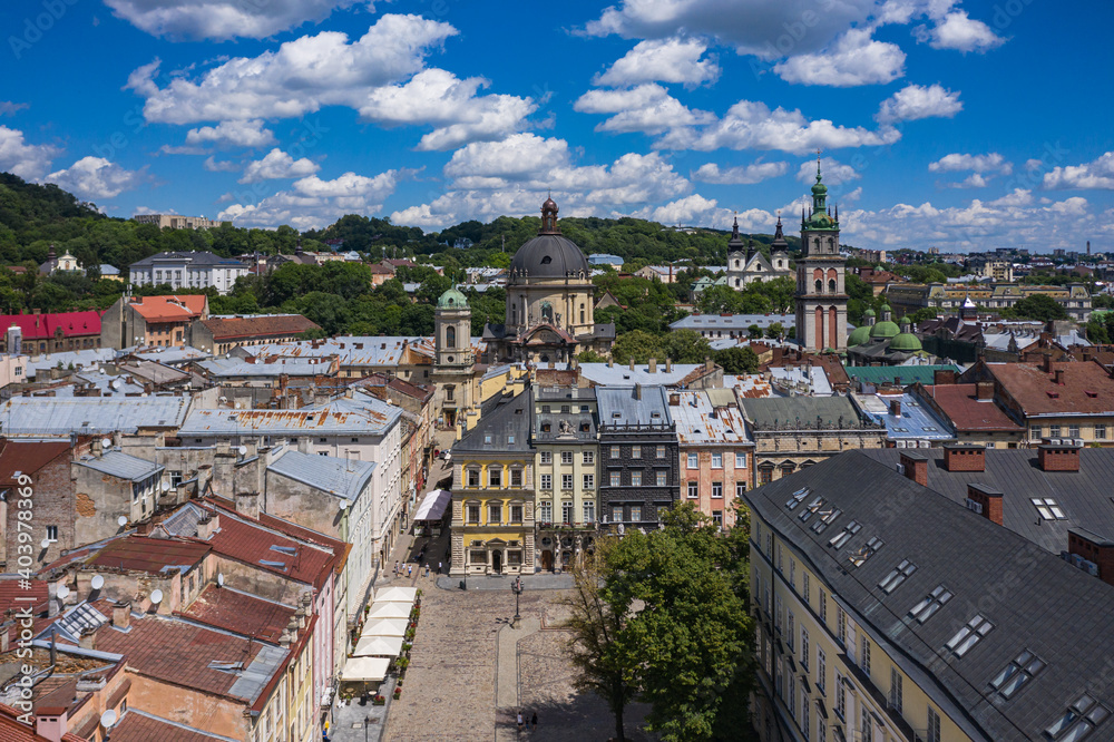 Aerial view on Market square, Dormition, Dominican and Carmelite Church in Lviv, Ukraine from drone
