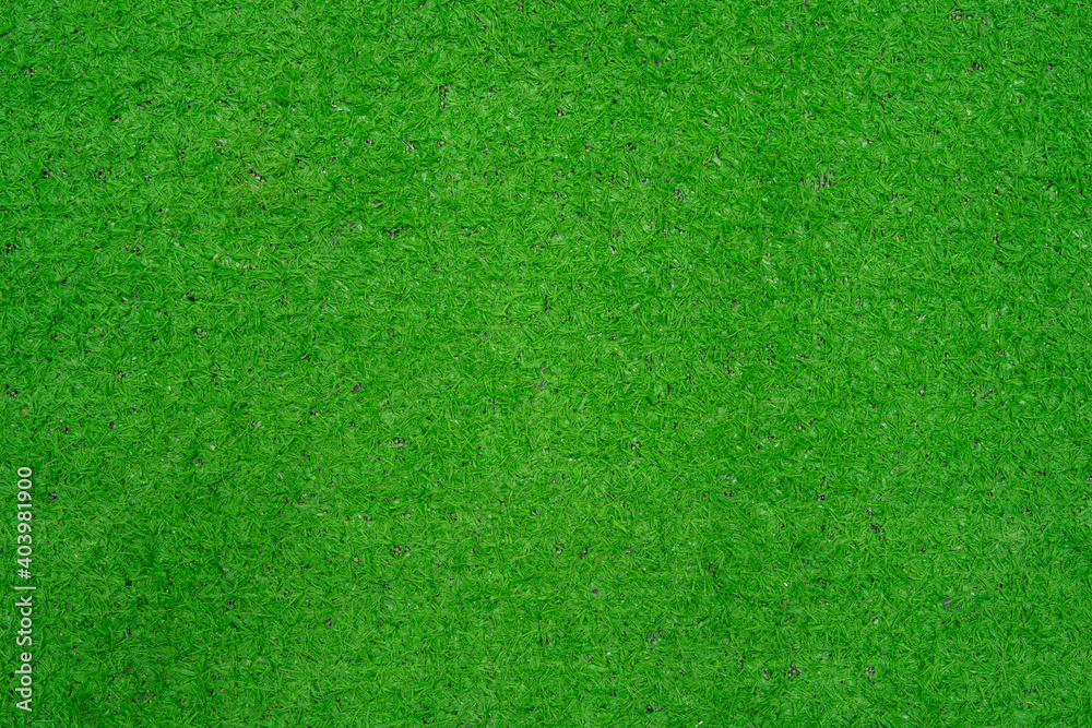 Thai native fan made from bamboo weave colorful isolated on green artificial grass. Thai native fan made from bamboo weave colorful isolated on green artificial grass.