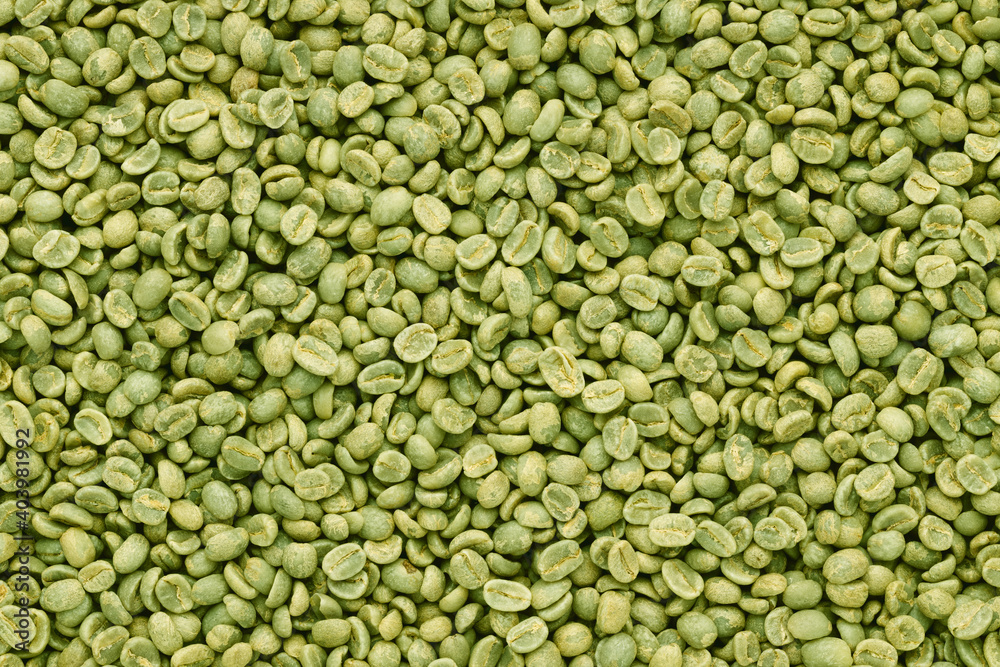 Green coffee beans top view background Green coffee beans top view background