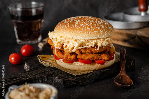 Homemade burger with chicken schnitzel photo