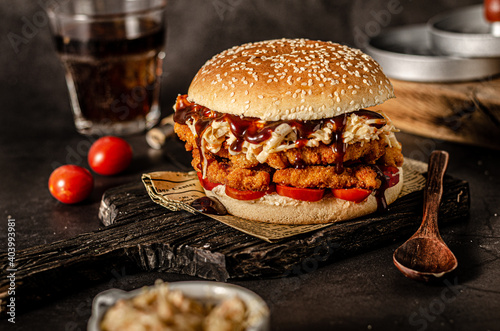 Homemade burger with chicken schnitzel photo