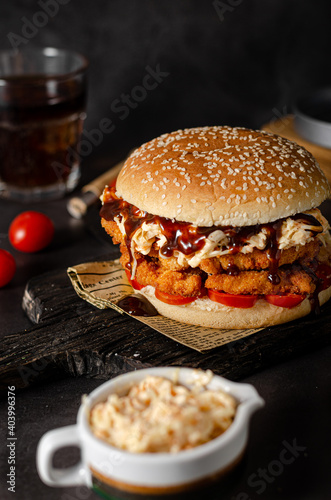 Homemade burger with chicken schnitzel photo