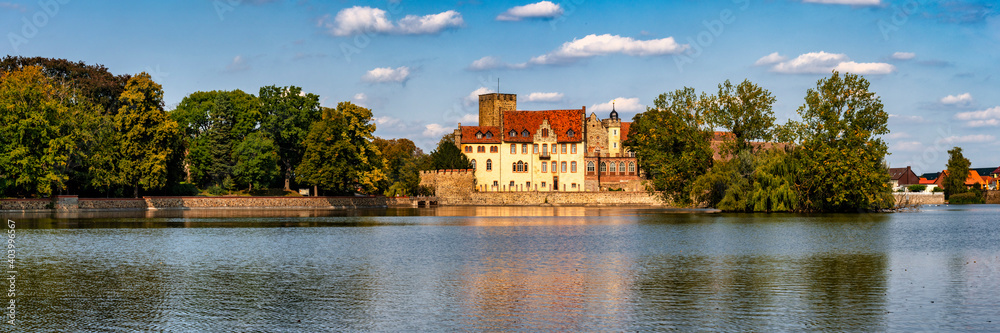 Germany, castle Flechtingen surrounded by a lake is a well known tourist attraction in Saxony-Anhalt