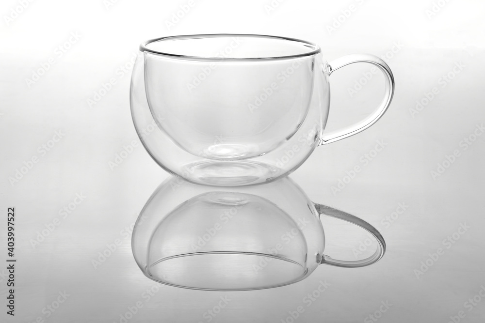 Glass cup for tea on a white background. Glass cup for tea on a white background.