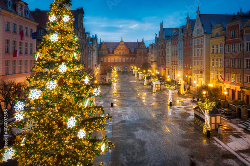 Christmas tree and decorations in snowy old town of Gdańsk. Poland