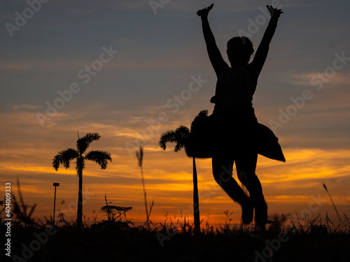 Silhouette of exercise or jumping for worm up