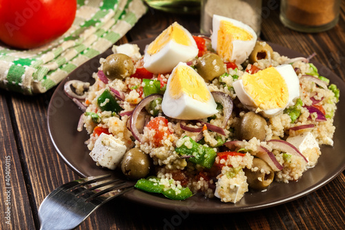 Fresh salad with couscous and eggs