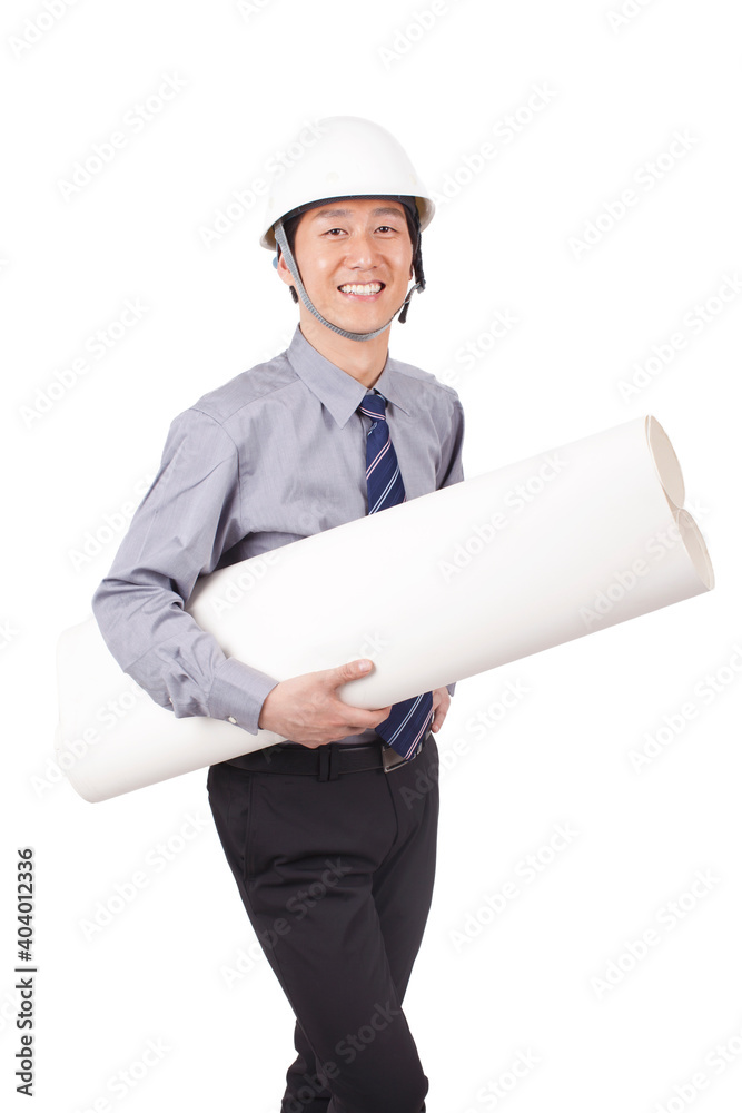 A happy young Construction management holding blueprints A happy young Construction management holding blueprints