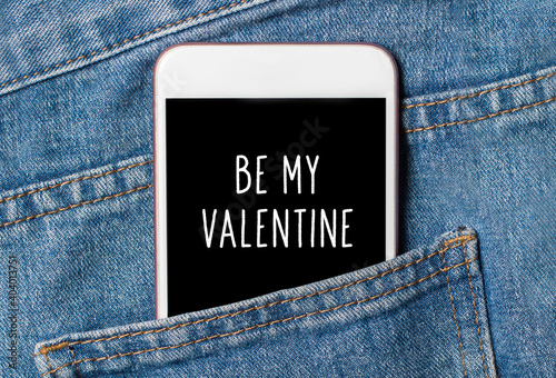 be my Valentine on background phone on jeans love and valentine concept