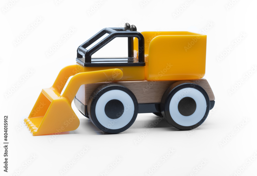 Colorful plastic and wooden toy car on on isolated white background