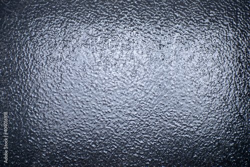 The texture of the icy window.