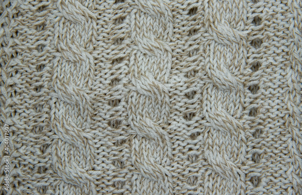 beige knitted pattern close up beige knitted pattern close up