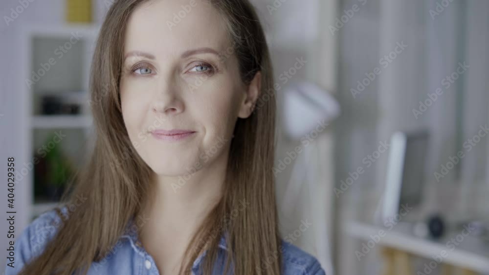 Portrait of happy white young woman at home, smiling. Portrait of happy white young woman at home, smiling.