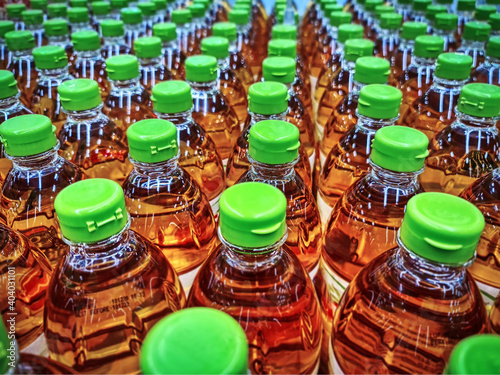 Full Frame Background of Group of Cooking Oil Bottles at Store