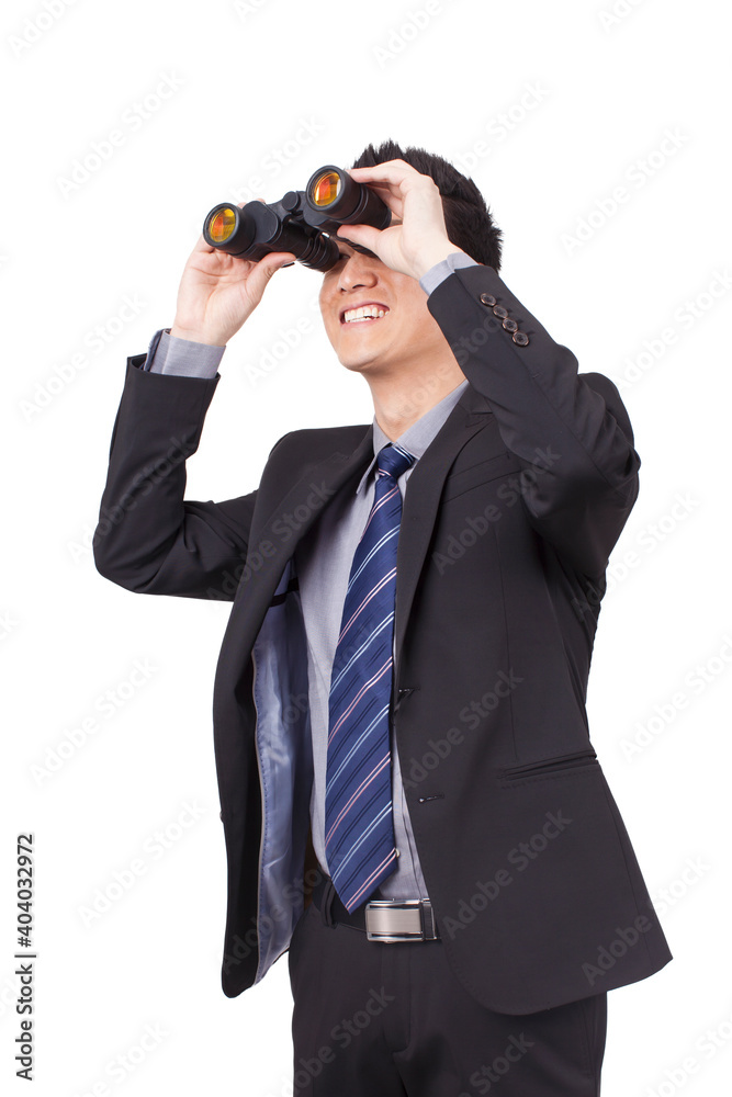 A young Business Man Looking Through Binoculars A young Business Man Looking Through Binoculars