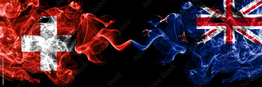 Switzerland, Swiss vs New Zealand, Kiwi smoky mystic flags placed side by side. Thick colored silky abstract smoke flags. Switzerland, Swiss vs New Zealand, Kiwi smoky mystic flags placed side by side. Thick colored silky abstract smoke flags.