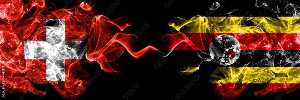 Switzerland, Swiss vs Uganda smoky mystic flags placed side by side. Thick colored silky abstract smoke flags.