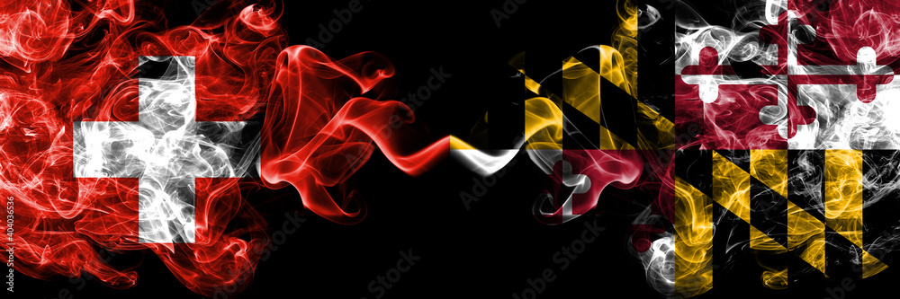 Switzerland, Swiss vs United States of America, America, US, USA, American, Maryland smoky mystic flags placed side by side. Thick colored silky abstract smoke flags. Switzerland, Swiss vs United States of America, America, US, USA, American, Maryland smoky mystic flags placed side by side. Thick colored silky abstract smoke flags.