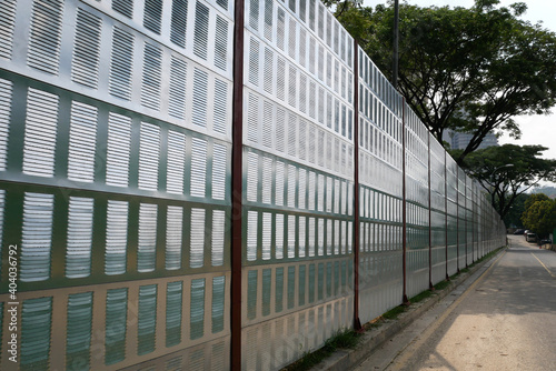 SELANGOR  MALAYSIA - JULY 2  2020  Noise barriers are installed along the vehicle lane bordering the residence to prevent noise pollution to the locals.