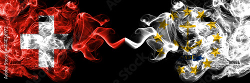 Switzerland  Swiss vs United States of America  America  US  USA  American  Rhode Island smoky mystic flags placed side by side. Thick colored silky abstract smoke flags.